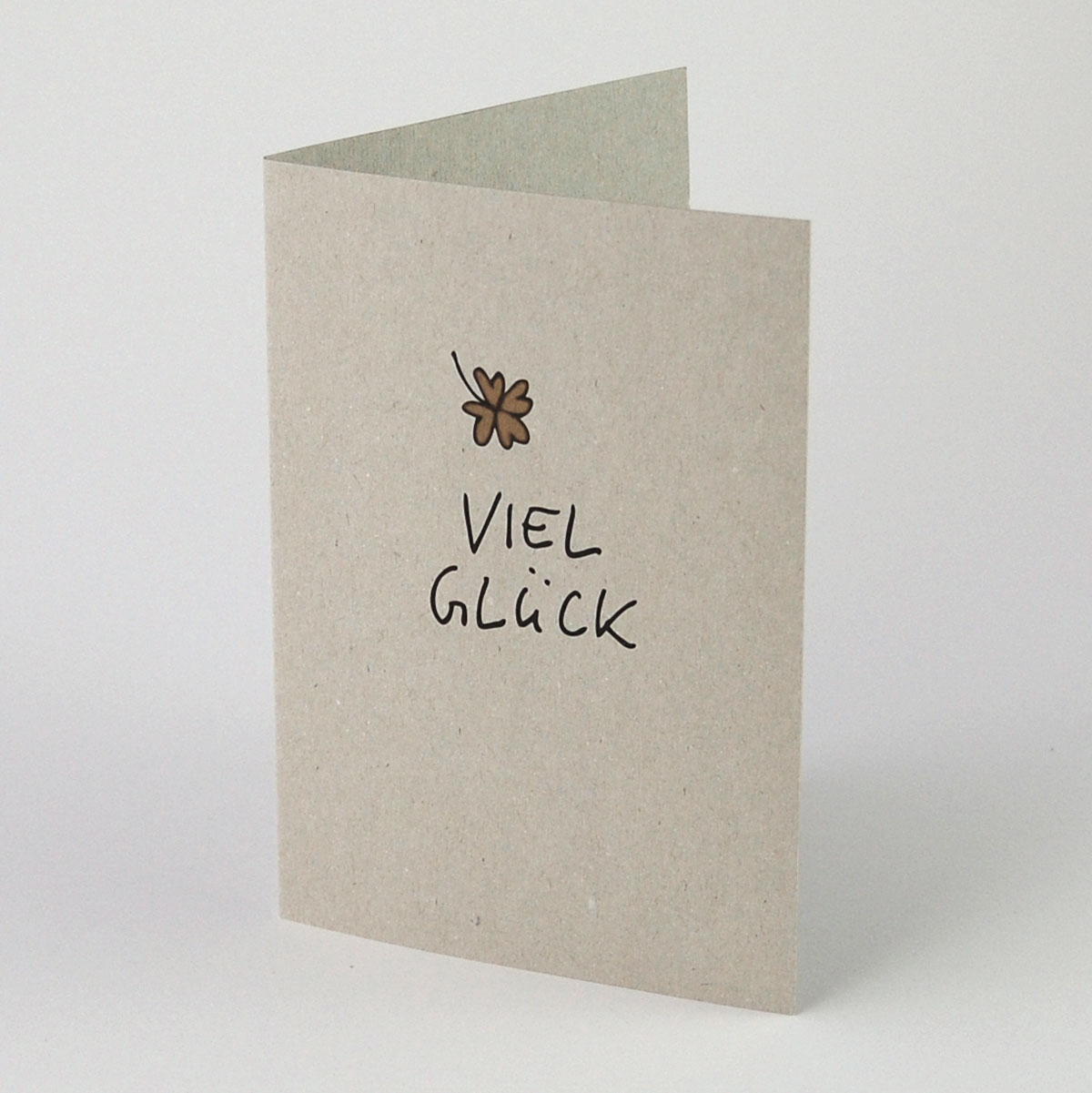 Viel Glück + goldenes, vierblättriges Kleeblatt, Glückwunschkarten aus grauem Recyclingkarton