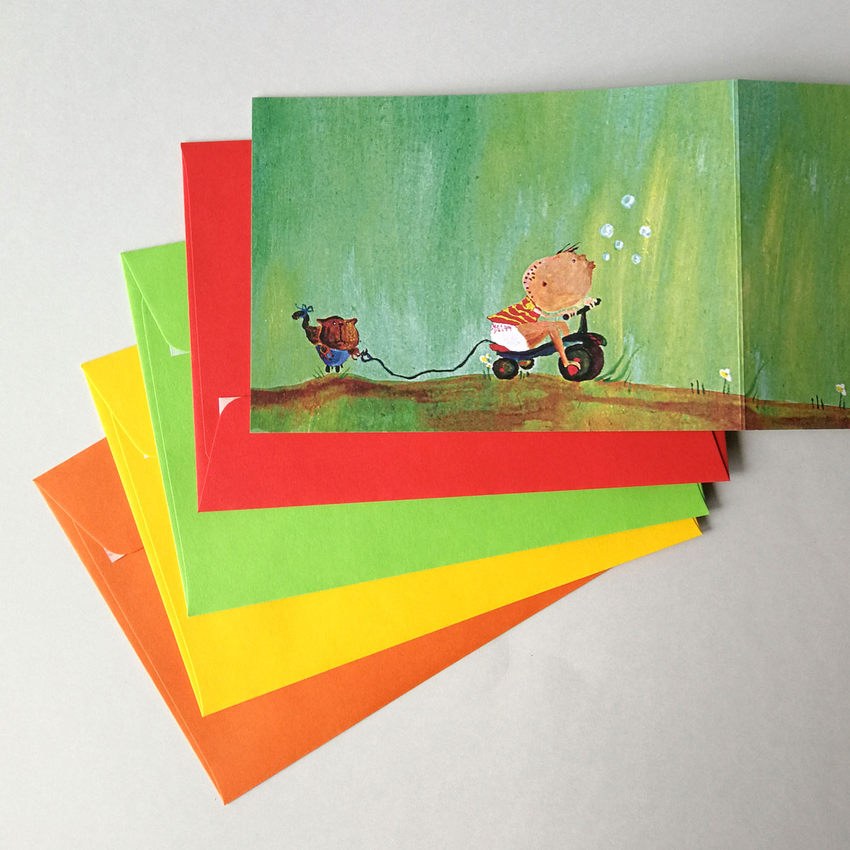 illustriertes Leporello mit Kindern, farbige Umschläge