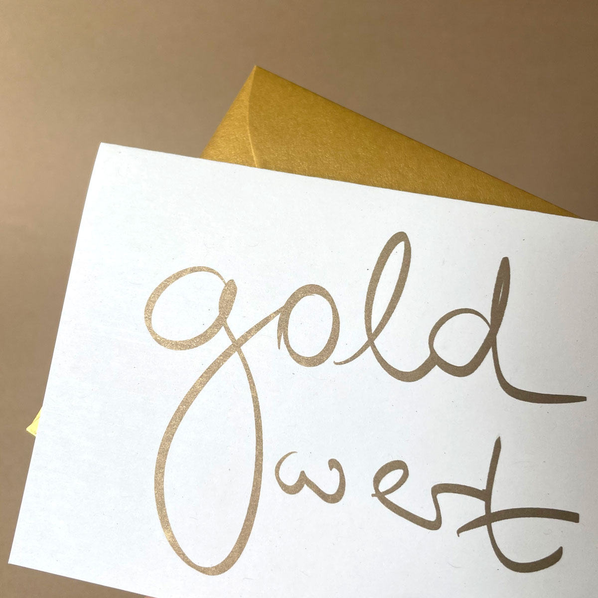 Klappkarten mit goldenen Umschlägen