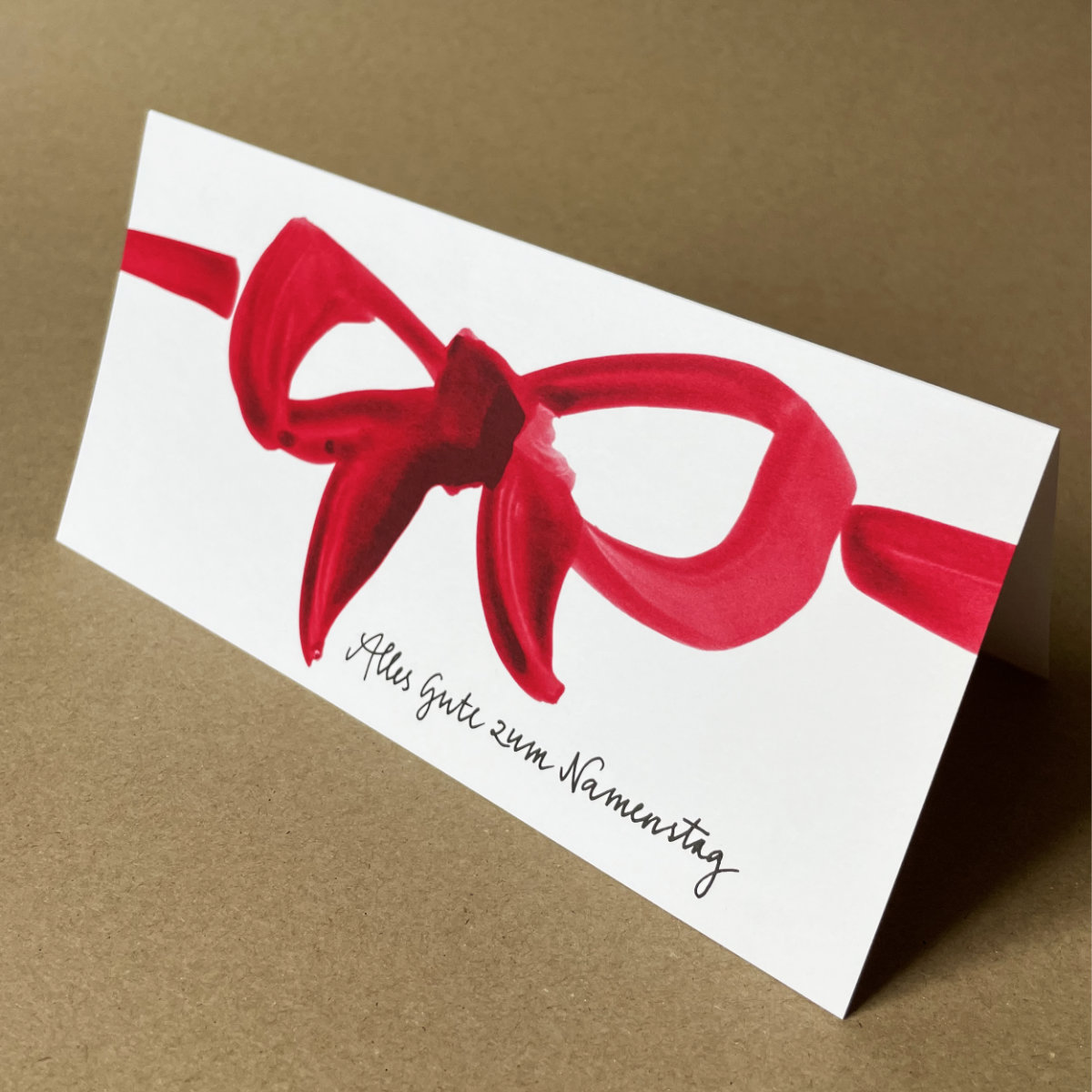 rote Schleife + Schriftzug Gl&uuml;ckwunsch zum Namenstag, Klappkarten