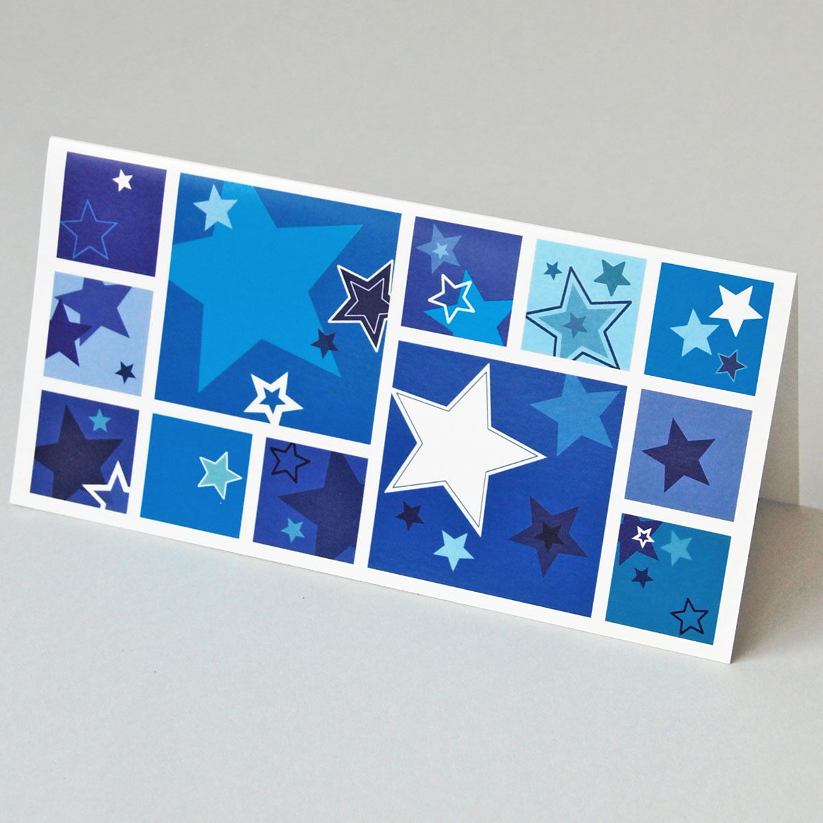 Weihnachtskarten mit weißen und blauen Sternen