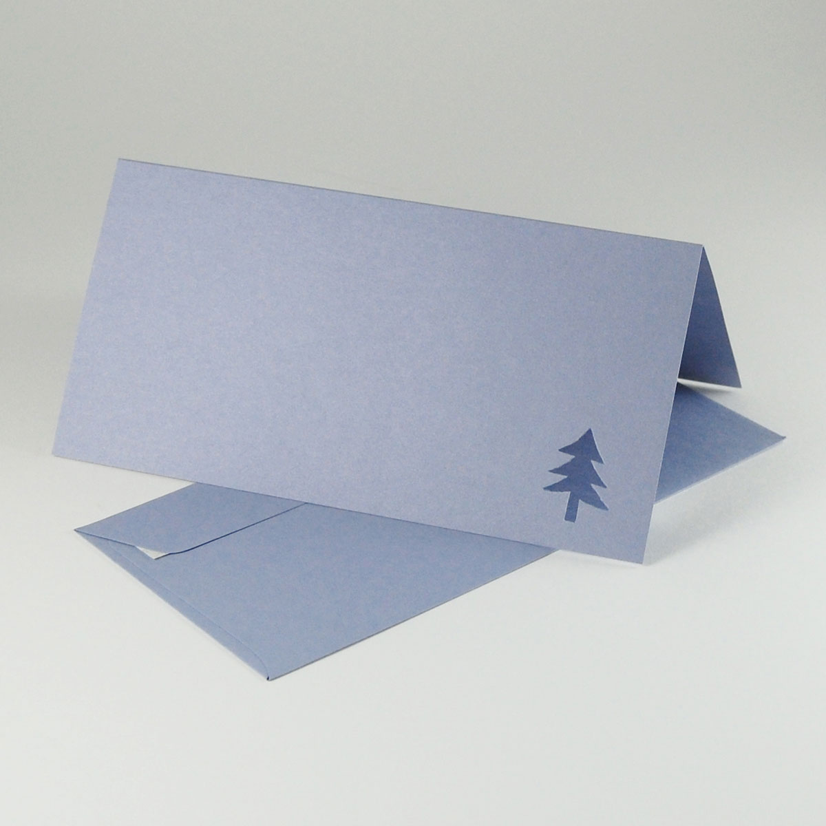 fliederfarbene Weihnachtskarte mit gleichfarbigen Umschlägen