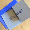lila gedruckte Design-Glückwunschkarten aus Graupappe