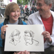 Portraitkarikaturen bei einem Berliner Straenfest