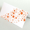 orange gedruckte Weihnachtskarten mit Sternen